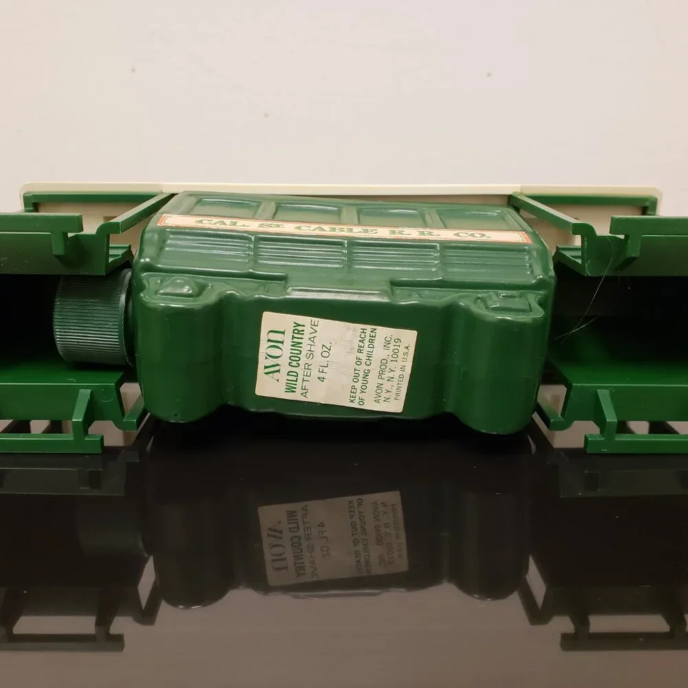 Vintage Avon San Francisco Green CABLE CAR Wild Country Scent Full Glass